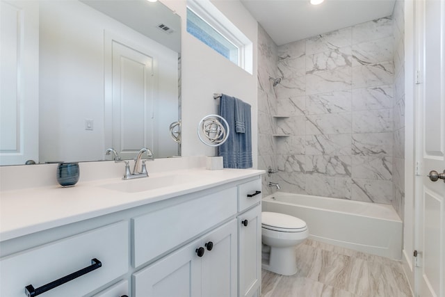 bathroom featuring toilet, vanity, bathing tub / shower combination, and recessed lighting