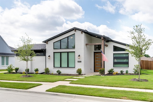 view of front facade featuring brick siding