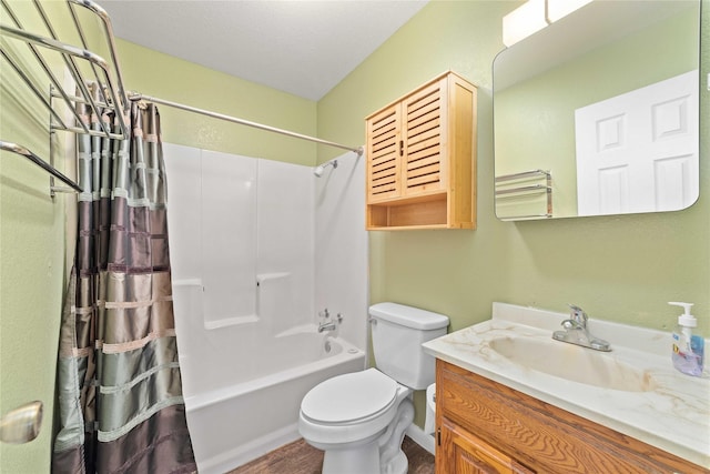 bathroom with toilet, vanity, shower / bath combo with shower curtain, and wood finished floors