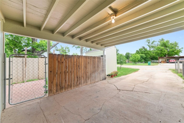 view of patio / terrace with a gate and fence