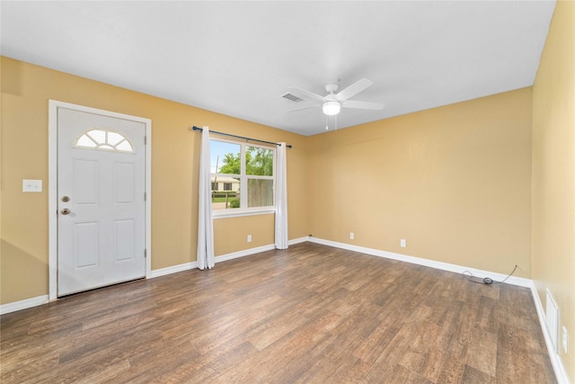 entrance foyer with wood finished floors, baseboards, and a ceiling fan