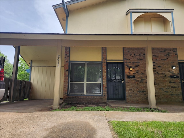 2612 Santa Barbara Dr, Grand Prairie, TX 75052 - property entrance featuring brick siding and fence