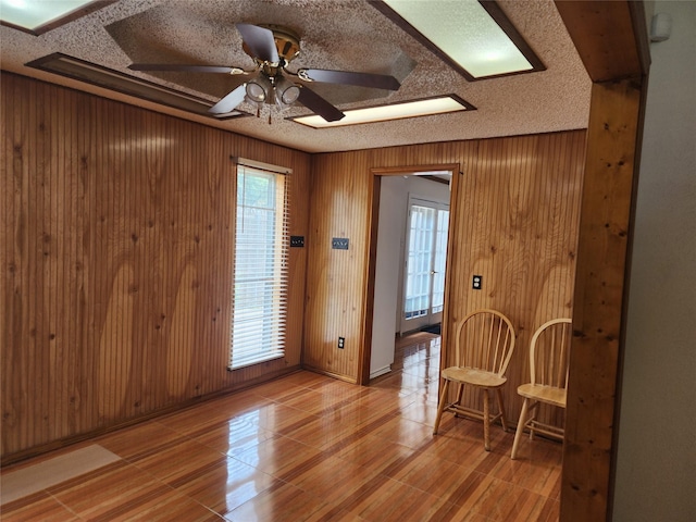 2612 Santa Barbara Dr, Grand Prairie, TX 75052 - empty room featuring wooden walls and a ceiling fan