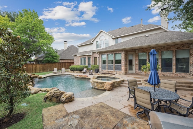 5063 Stillwater Trl, Frisco, TX 75034 - view of swimming pool featuring fence, a patio, and a pool with connected hot tub