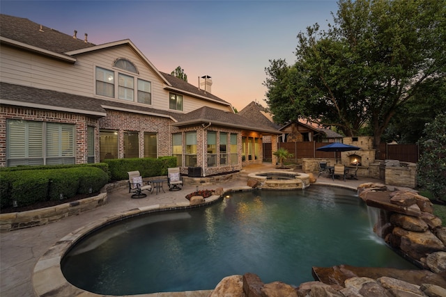 5063 Stillwater Trl, Frisco, TX 75034 - view of swimming pool featuring a patio, fence, and a pool with connected hot tub