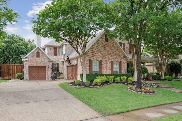 5063 Stillwater Trl, Frisco, TX 75034 - view of front facade with brick siding, concrete driveway, and an attached garage