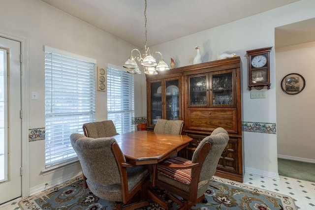 600 Hanover Dr, Waxahachie, TX 75165 - dining area featuring a chandelier, plenty of natural light, and tile patterned floors