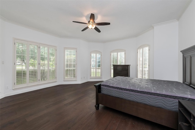 7100 Oakbrook Dr, Plano, TX 75025 - bedroom featuring dark wood-style floors, multiple windows, ornamental molding, a ceiling fan, and baseboards