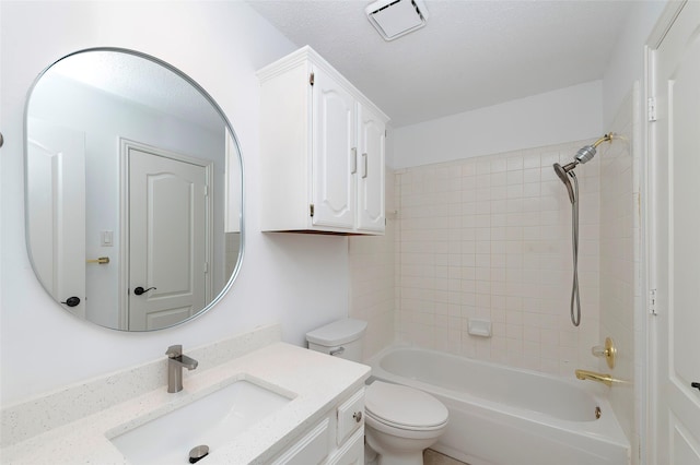 7100 Oakbrook Dr, Plano, TX 75025 - full bath featuring toilet, vanity, and tub / shower combination