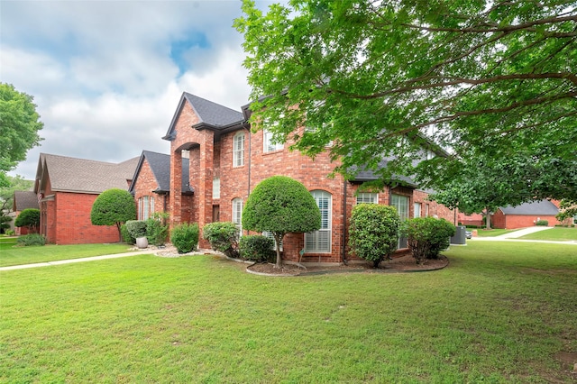 7100 Oakbrook Dr, Plano, TX 75025 - view of front of house with brick siding and a front yard