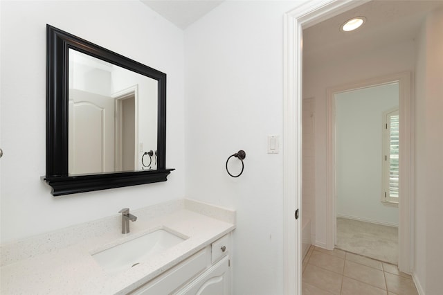 7100 Oakbrook Dr, Plano, TX 75025 - full bathroom featuring tile patterned floors, vanity, baseboards, and recessed lighting