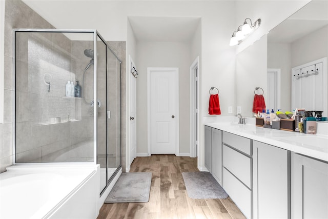 7225 Tesoro Trl, Fort Worth, TX 76131 - full bathroom featuring a shower stall, wood finished floors, double vanity, and a bath