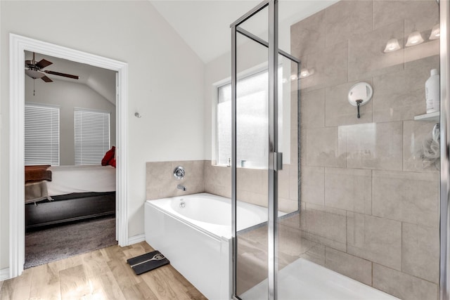 7225 Tesoro Trl, Fort Worth, TX 76131 - ensuite bathroom featuring lofted ceiling, a garden tub, a ceiling fan, a stall shower, and wood finished floors