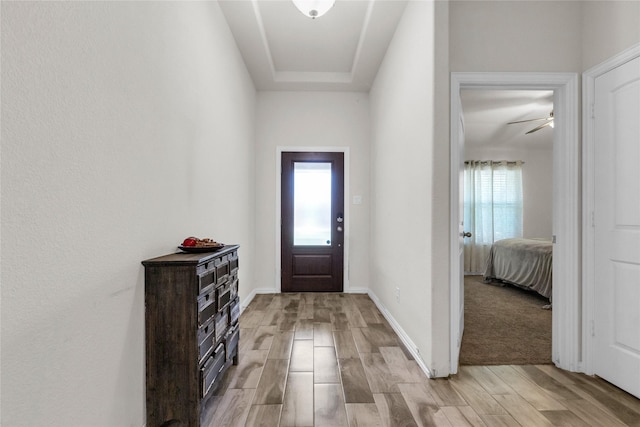 7225 Tesoro Trl, Fort Worth, TX 76131 - entryway featuring light wood finished floors, baseboards, and ceiling fan