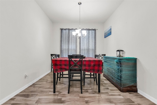 7225 Tesoro Trl, Fort Worth, TX 76131 - dining room featuring a chandelier, wood finished floors, and baseboards