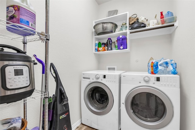 7225 Tesoro Trl, Fort Worth, TX 76131 - clothes washing area with washer and clothes dryer and wood finished floors