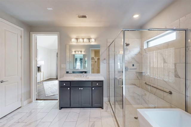 16175 Barton Creek Ln, Frisco, TX 75033 - bathroom with a stall shower, vanity, marble finish flooring, recessed lighting, and baseboards