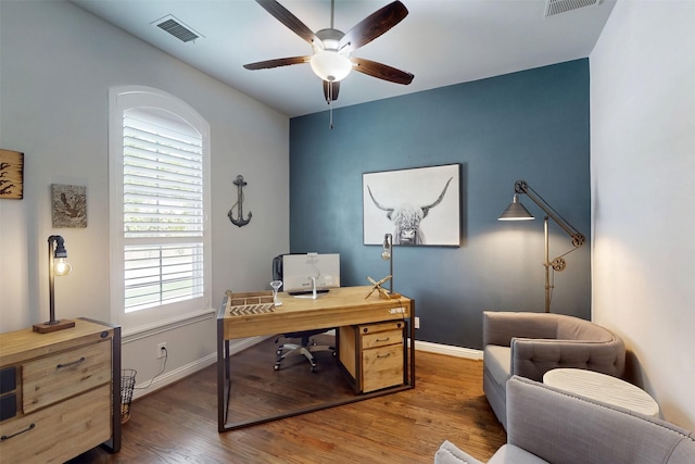 16175 Barton Creek Ln, Frisco, TX 75033 - home office featuring a ceiling fan, wood finished floors, and baseboards