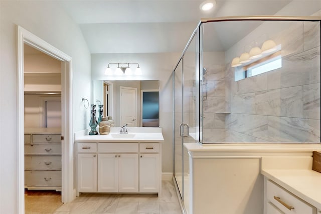 16175 Barton Creek Ln, Frisco, TX 75033 - bathroom with vanity, a stall shower, and marble finish flooring
