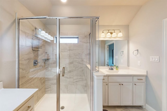 16175 Barton Creek Ln, Frisco, TX 75033 - full bathroom featuring vanity, a stall shower, and baseboards