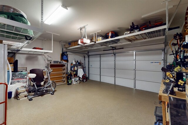 16175 Barton Creek Ln, Frisco, TX 75033 - garage featuring a garage door opener