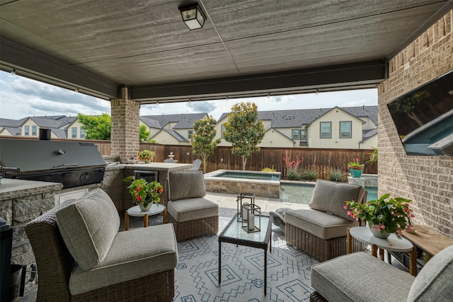 16175 Barton Creek Ln, Frisco, TX 75033 - view of patio / terrace featuring area for grilling, a fenced backyard, an outdoor living space, and a residential view
