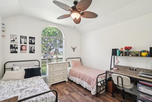 bedroom featuring lofted ceiling, dark wood finished floors, a desk, and ceiling fan