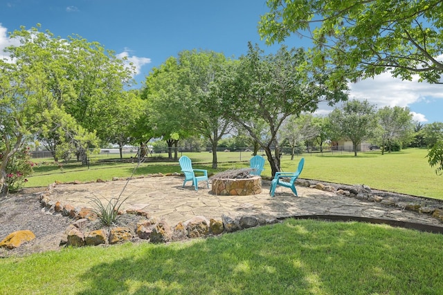view of patio featuring a fire pit