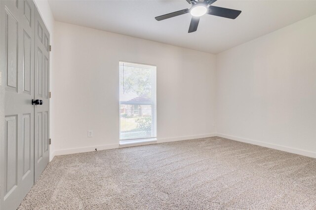 22 W Mountain Ln Unit 42, Grand Prairie, TX 75052 - carpeted spare room featuring ceiling fan and baseboards