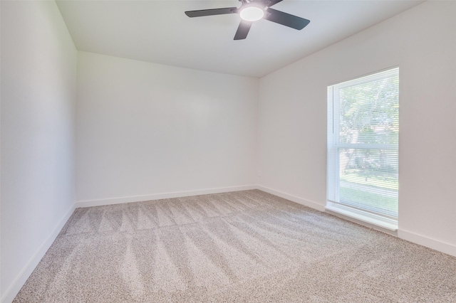 22 W Mountain Ln Unit 42, Grand Prairie, TX 75052 - carpeted empty room featuring plenty of natural light, ceiling fan, and baseboards