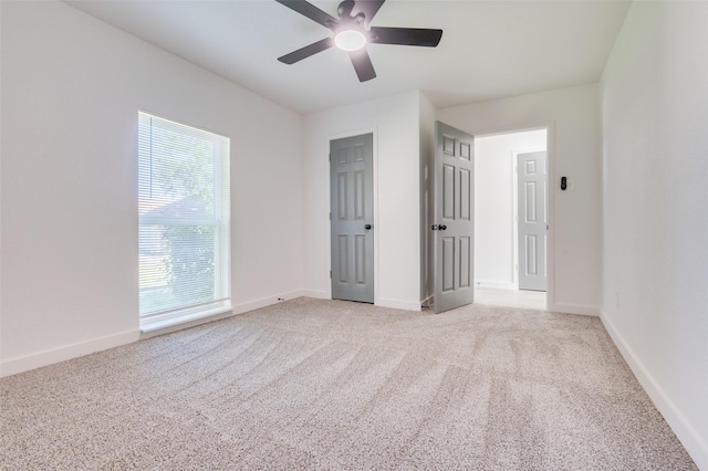 22 W Mountain Ln Unit 42, Grand Prairie, TX 75052 - unfurnished bedroom featuring carpet flooring, baseboards, and ceiling fan
