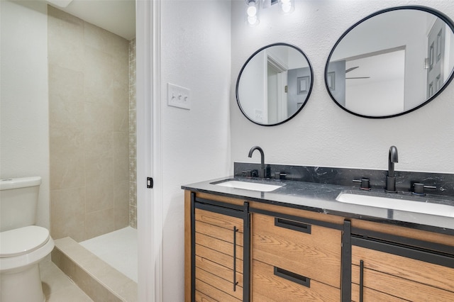 22 W Mountain Ln Unit 42, Grand Prairie, TX 75052 - full bath featuring toilet, double vanity, and a tile shower