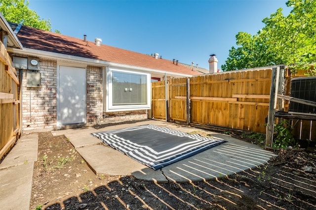 22 W Mountain Ln Unit 42, Grand Prairie, TX 75052 - view of patio / terrace with fence and central air condition unit