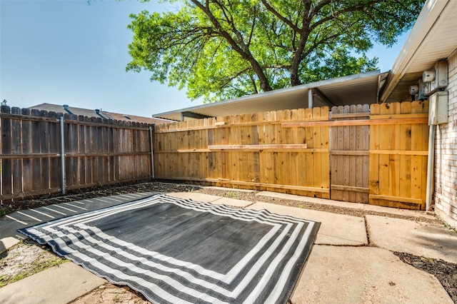22 W Mountain Ln Unit 42, Grand Prairie, TX 75052 - view of patio featuring fence