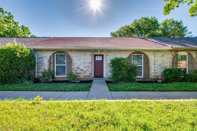 22 W Mountain Ln Unit 42, Grand Prairie, TX 75052 - single story home with brick siding and roof with shingles