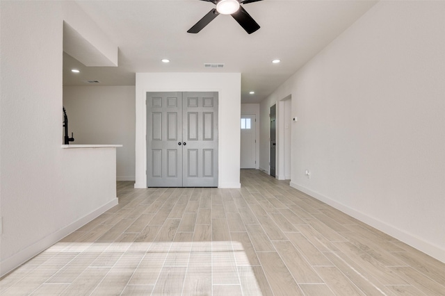 22 W Mountain Ln Unit 42, Grand Prairie, TX 75052 - unfurnished room with recessed lighting, ceiling fan, light wood-type flooring, and baseboards