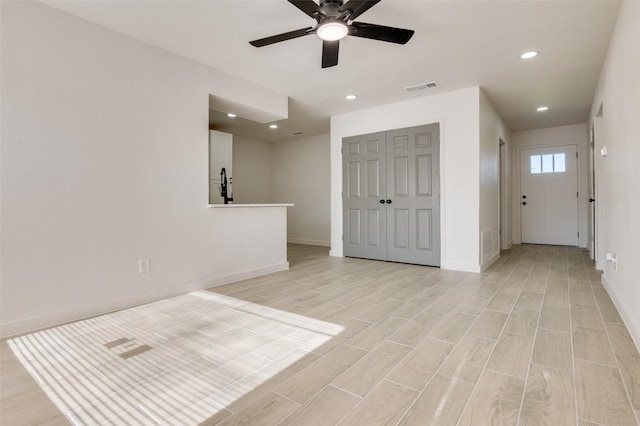 22 W Mountain Ln Unit 42, Grand Prairie, TX 75052 - entrance foyer featuring ceiling fan, baseboards, recessed lighting, and light wood-type flooring