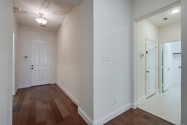 15429 Pioneer Bluff Trl, Fort Worth, TX 76262 - hall with dark wood-style flooring and baseboards