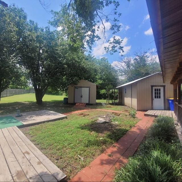 1101 Dell St, White Settlement, TX 76108 - view of green lawn featuring a wooden deck