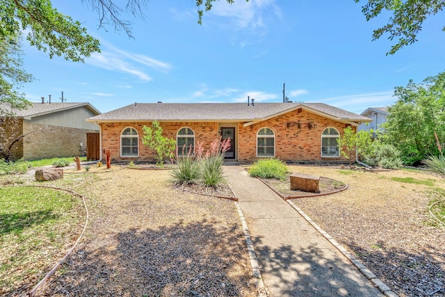 932 Goodwin Dr, Plano, TX 75023 - single story home with brick siding and roof with shingles