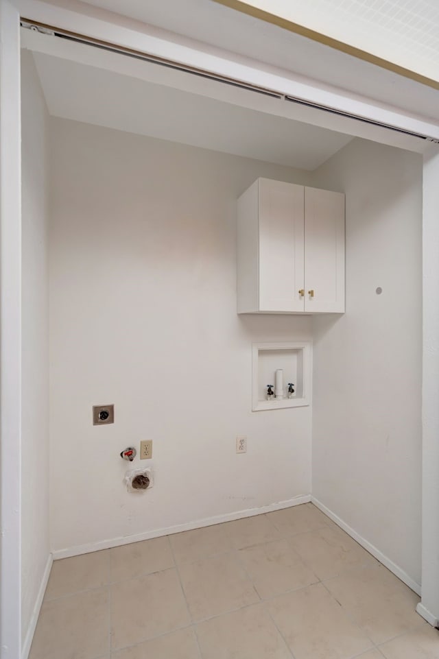 932 Goodwin Dr, Plano, TX 75023 - laundry area with hookup for an electric dryer, cabinet space, washer hookup, hookup for a gas dryer, and baseboards
