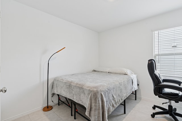 301 Dry Canyon Way, Fort Worth, TX 76052 - bedroom featuring baseboards and light tile patterned floors