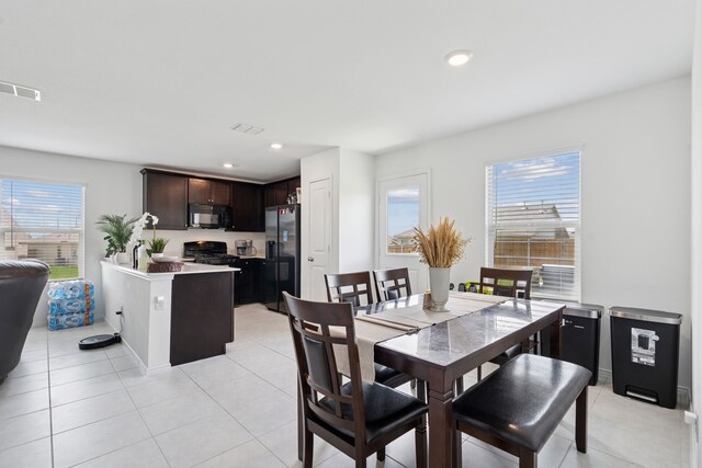 301 Dry Canyon Way, Fort Worth, TX 76052 - dining room with light tile patterned floors, recessed lighting, and baseboards