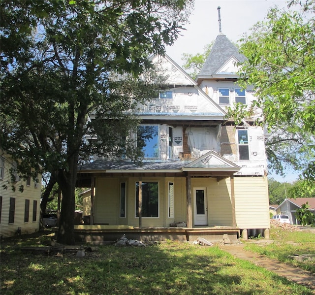 211 N Pleasant St, Hillsboro, TX 76645 - back of property with a porch and a balcony