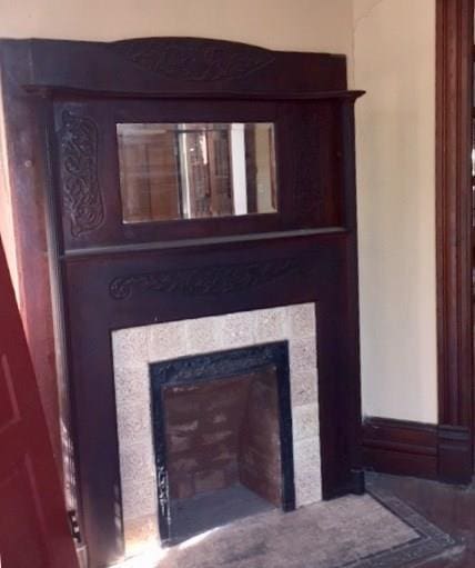 211 N Pleasant St, Hillsboro, TX 76645 - detailed view of a tiled fireplace