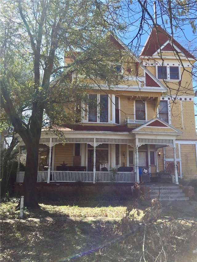 211 N Pleasant St, Hillsboro, TX 76645 - victorian house with covered porch