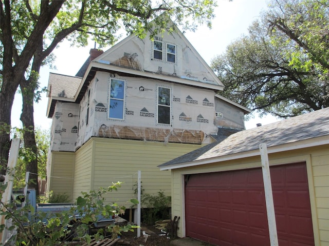 211 N Pleasant St, Hillsboro, TX 76645 - view of home's exterior featuring a garage