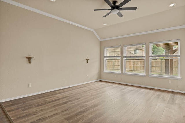 3305 Francis Dr, Wylie, TX 75098 - empty room with crown molding, vaulted ceiling, a ceiling fan, baseboards, and light wood-style floors