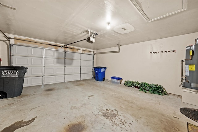 garage with a garage door opener and water heater