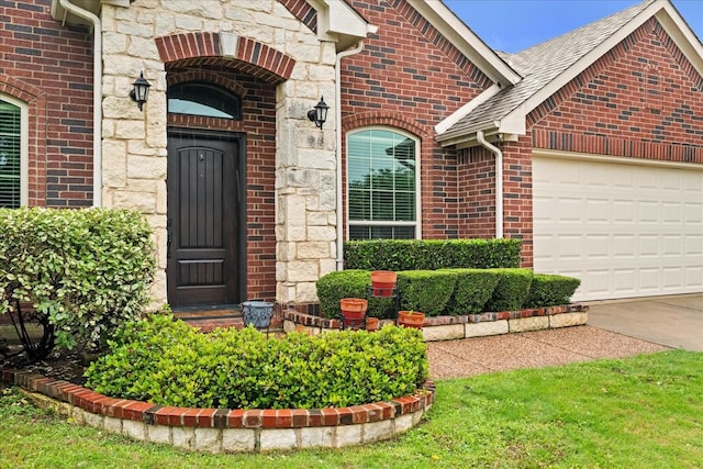 3305 Francis Dr, Wylie, TX 75098 - entrance to property featuring brick siding, a garage, driveway, and stone siding